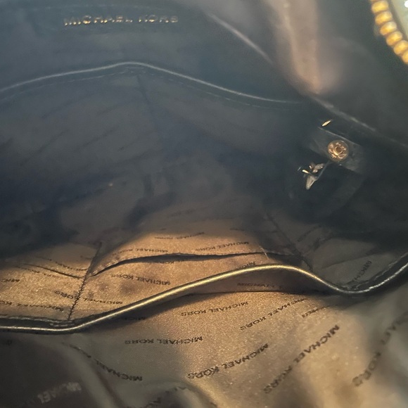 Michael Kors pebbled black leather slouch purse with fringe and emblem detail - Picture 5 of 6